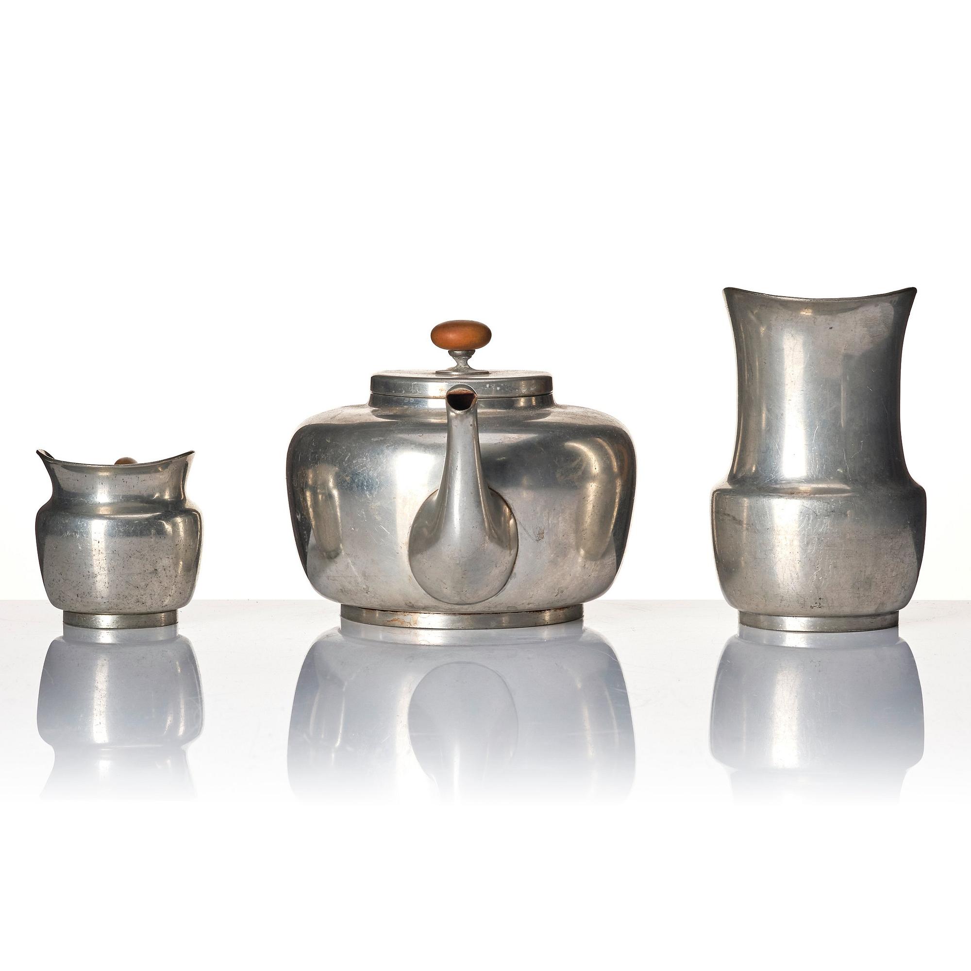 Josef Frank, a four pieces pewter tea service and a tray, model "A2330", Svenskt Tenn, Stockholm 1946 (tray 1929).