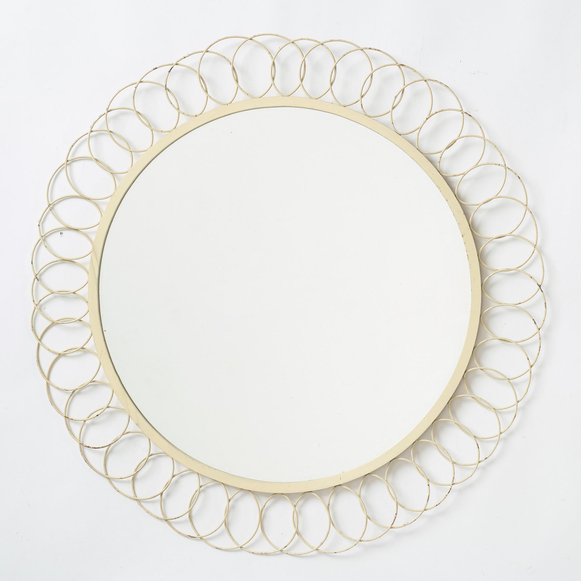 A painted metal mirror, first half of the 20th century.