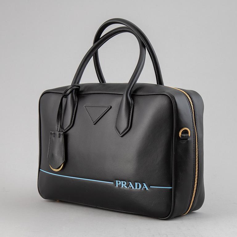 PRADA, a leather bag.