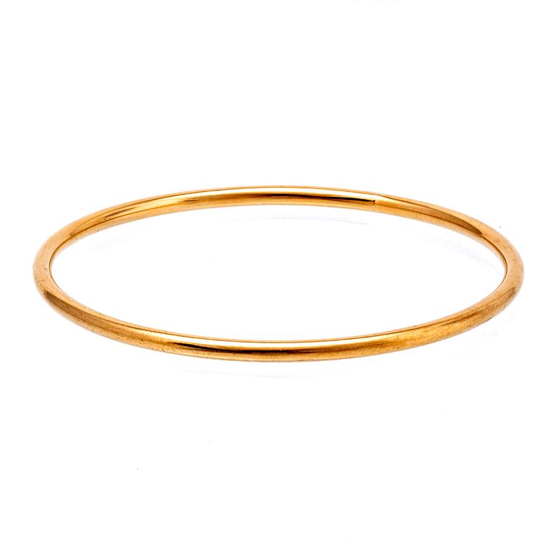 Bangle 18K gold, 23,6 g, inner circumference approx 19 cm, does not open.