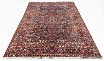 A semi-antique Isfahan rug, central Persia, c. 305 x 205 cm.