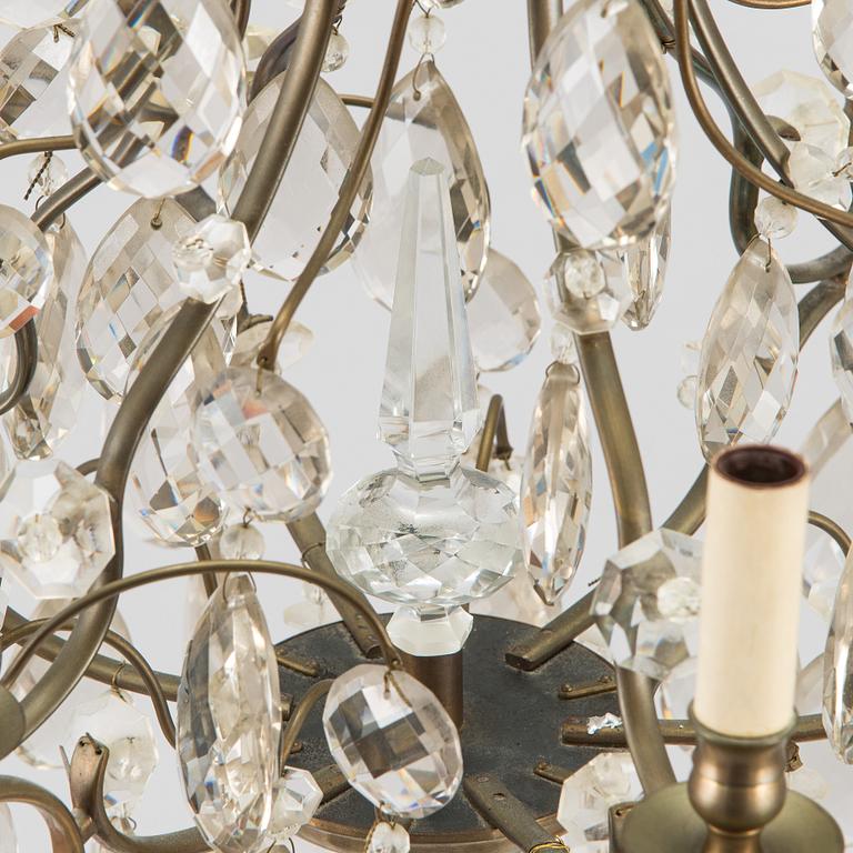 A rococo style chandelier, early 20th century.