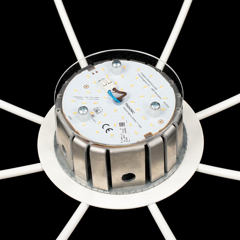 a 'Hoop' ceiling lamp by Front design for Zero.