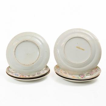 A matched set of 14 famille rose 'Canton' dinner plates, Qing dynasty, 19th century.