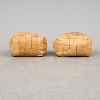 TWO POUFS, signed Camelbag. Second half of the 20th century.