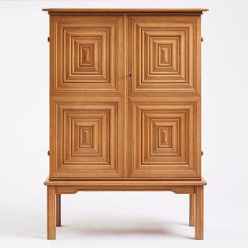 Oscar Nilsson, attributed to, a Swedish Modern oak cabinet, 1940s.