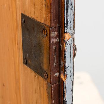 A late gustavian cabinet, circa 1800.