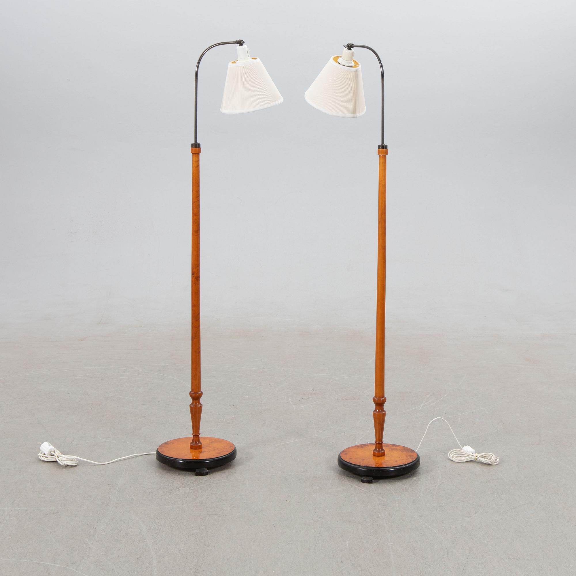 Floor lamps, a pair, 1940s.