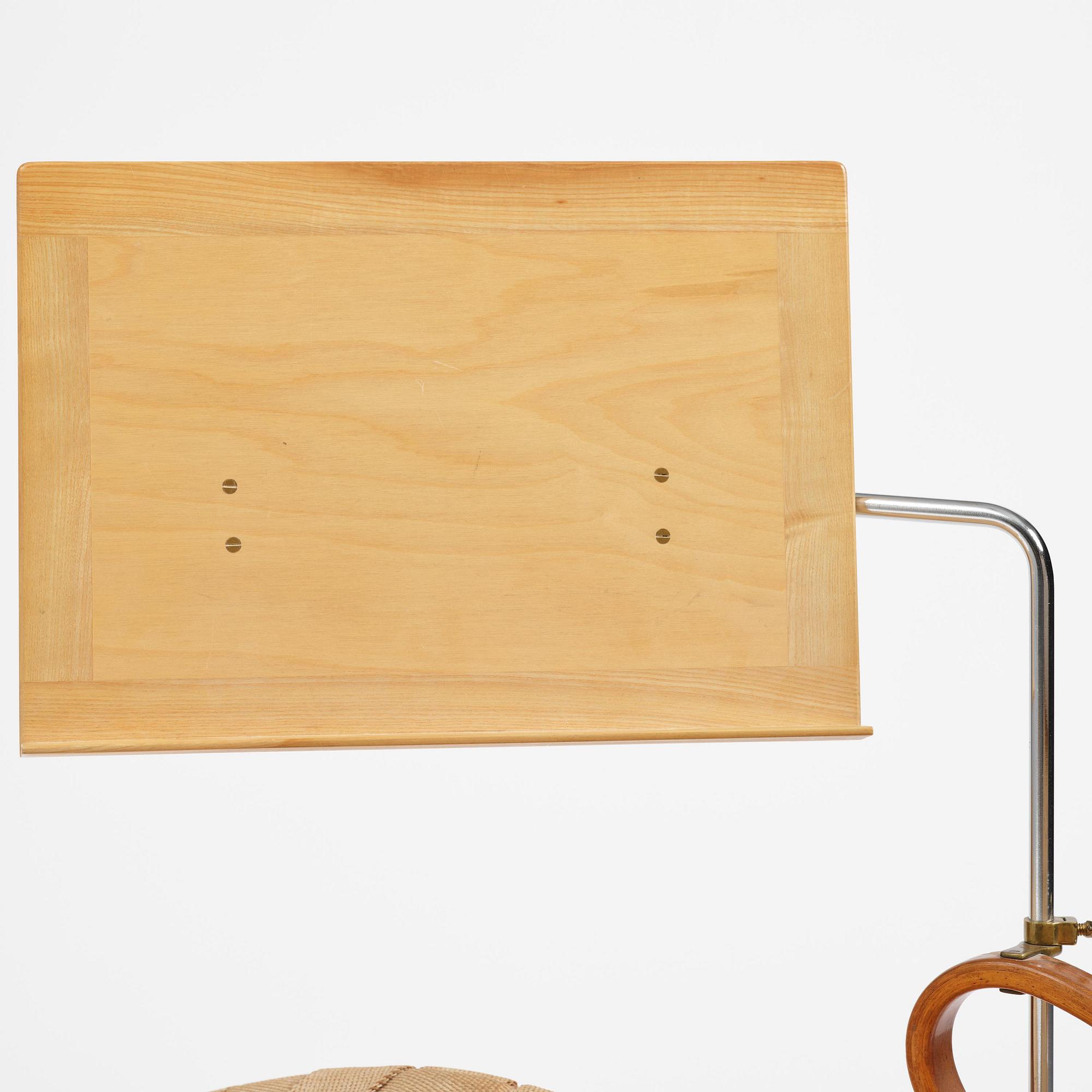 Bruno Mathsson, a lounge chair with wheels, Firma Karl Mathsson, Värnamo, 1940s, with reading table from 1972.