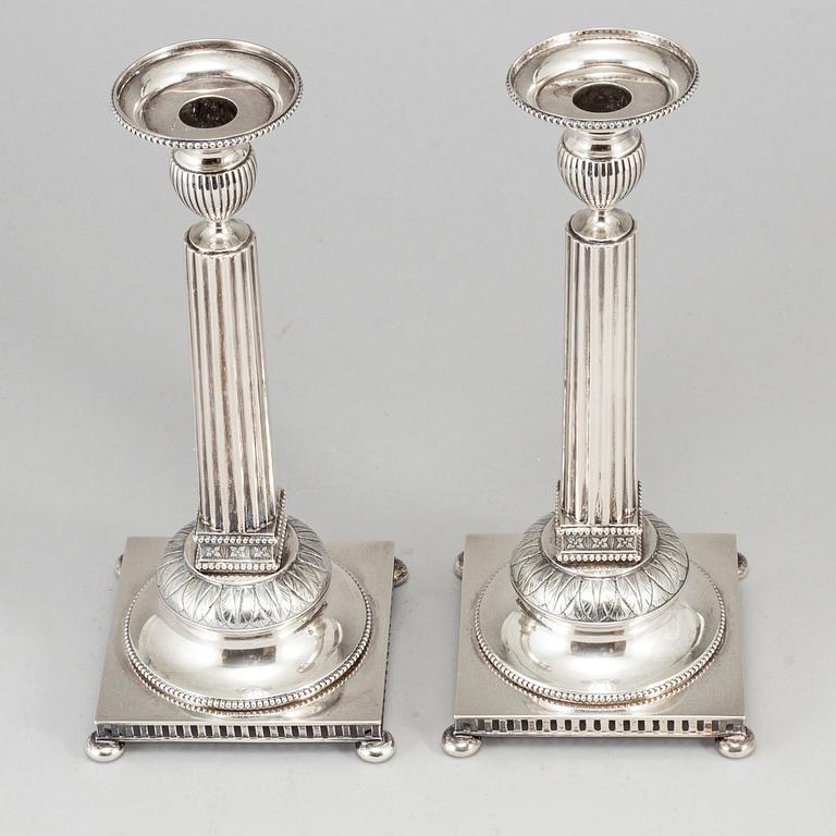 A pair of Swedish early 20th century silver candlesticks, mark of JE Torsk, Stockholm 1900.