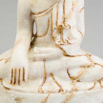 An alabaster figure of Buddha, probably Burma, 20th century.