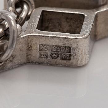 Jorma Laine, a set of two silver pendants, a bracelet and a brooch. Kultateollisuus Oy, Turku 1965-1972.