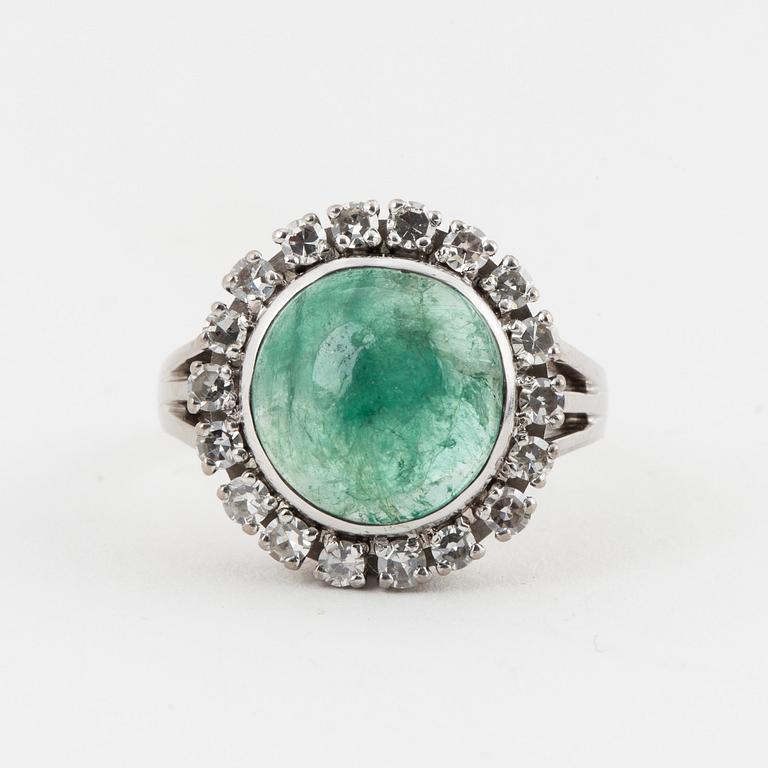 A cabochon cut emerald and singel cut diamond ring by Ceson, Göteborg, 1965.