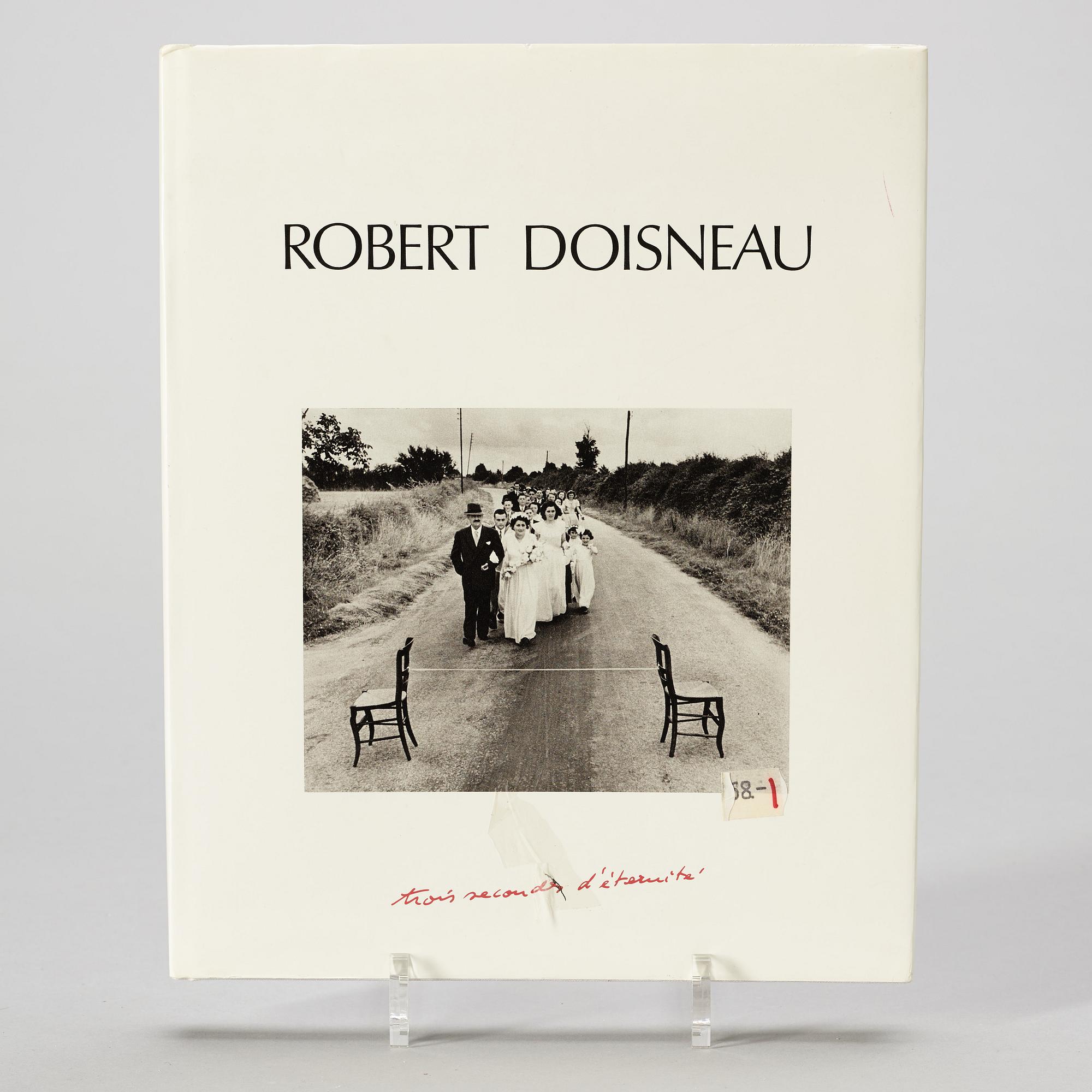 Photo books, 8, French photographers e.a Cartier-Bresson, Brassai and Lartigue.