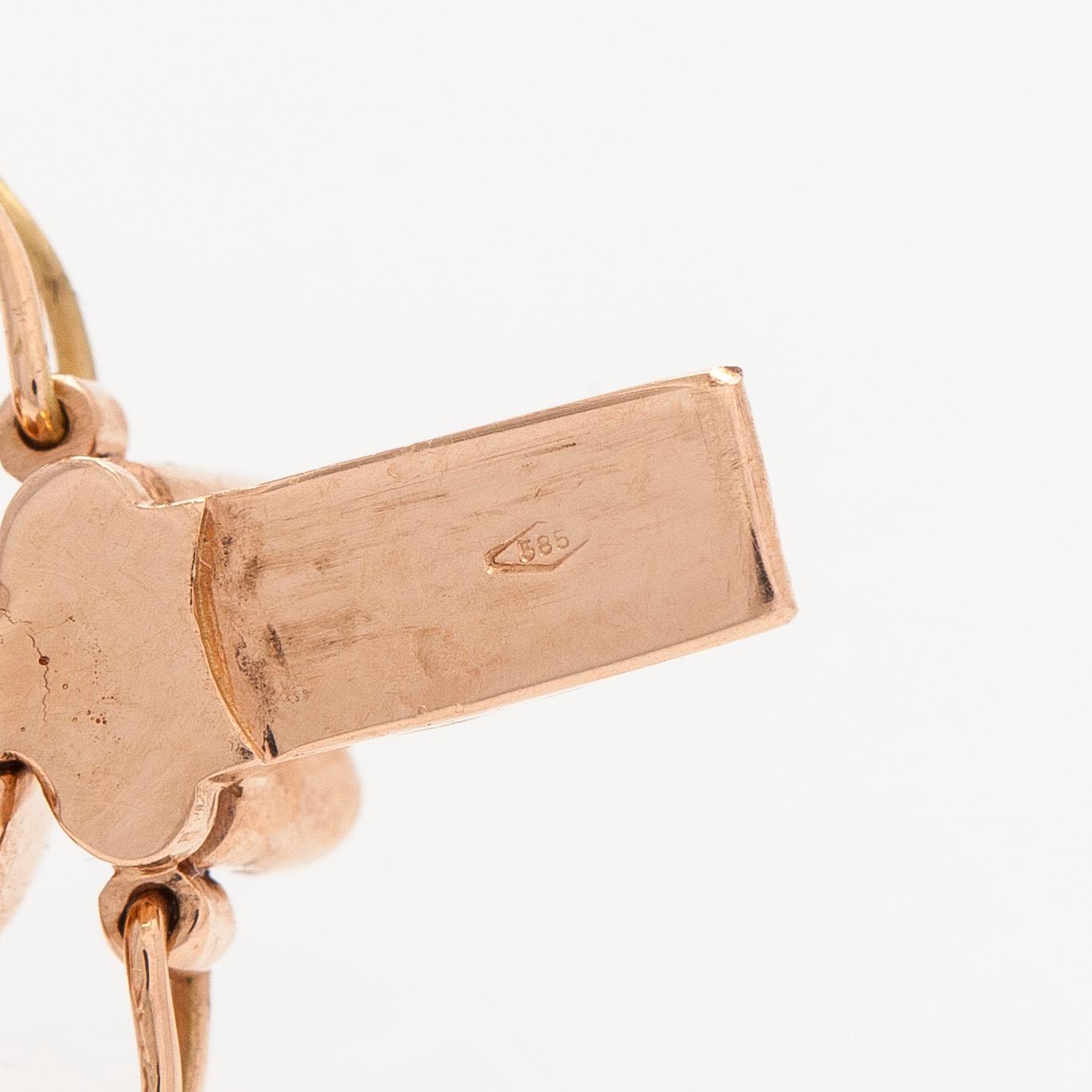 A multi colour sapphire and diamond bracelet in 14K rosegold.