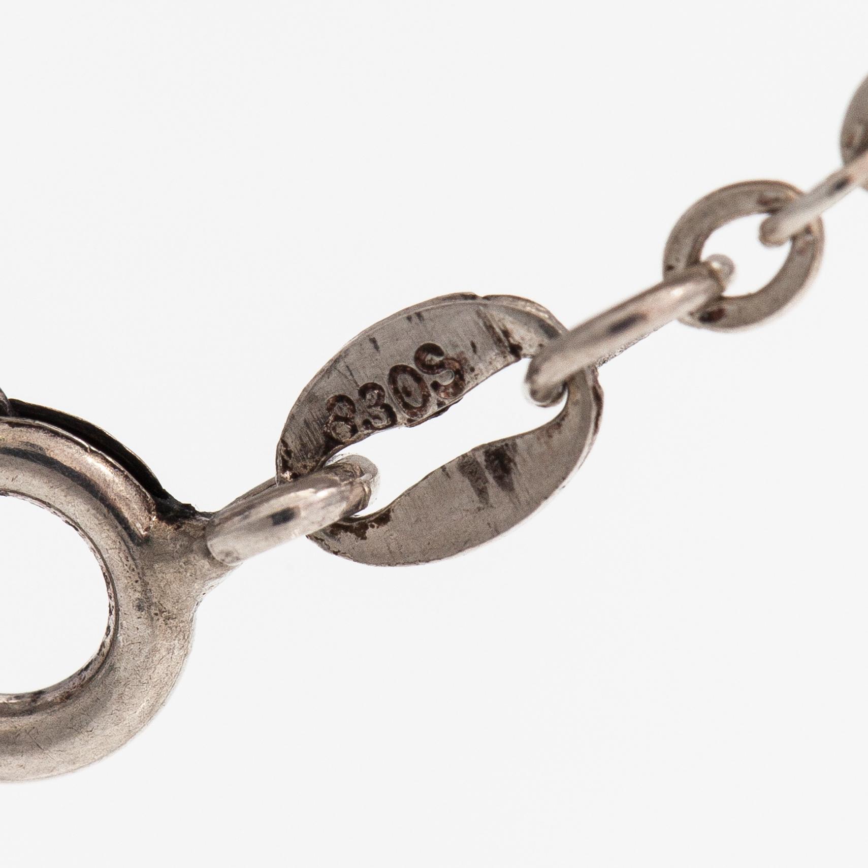 Elis Kauppi, A sterling silver necklace with a red carneol. Kupittaan kulta, Turku 1974.