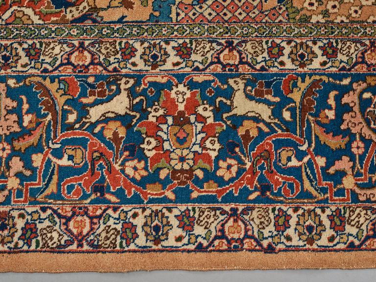 A carpet, semi-antique Tabriz, ca 404 x 292 cm.