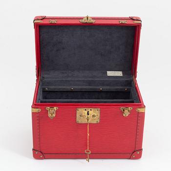 Louis Vuitton, a red Epi beauty box.