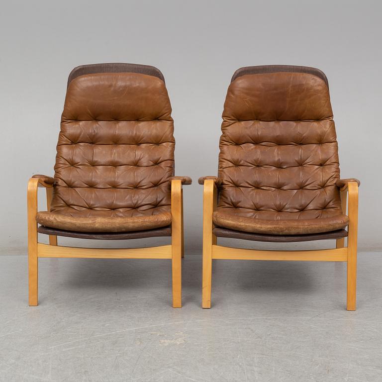 A pair of 1970's 'Mona' armchairs by Sam Larsson for Dux.