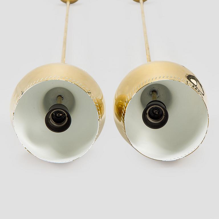 Paavo Tynell, a pair of mid 20th century ceiling lights, model 1699, for Taito / Idman.