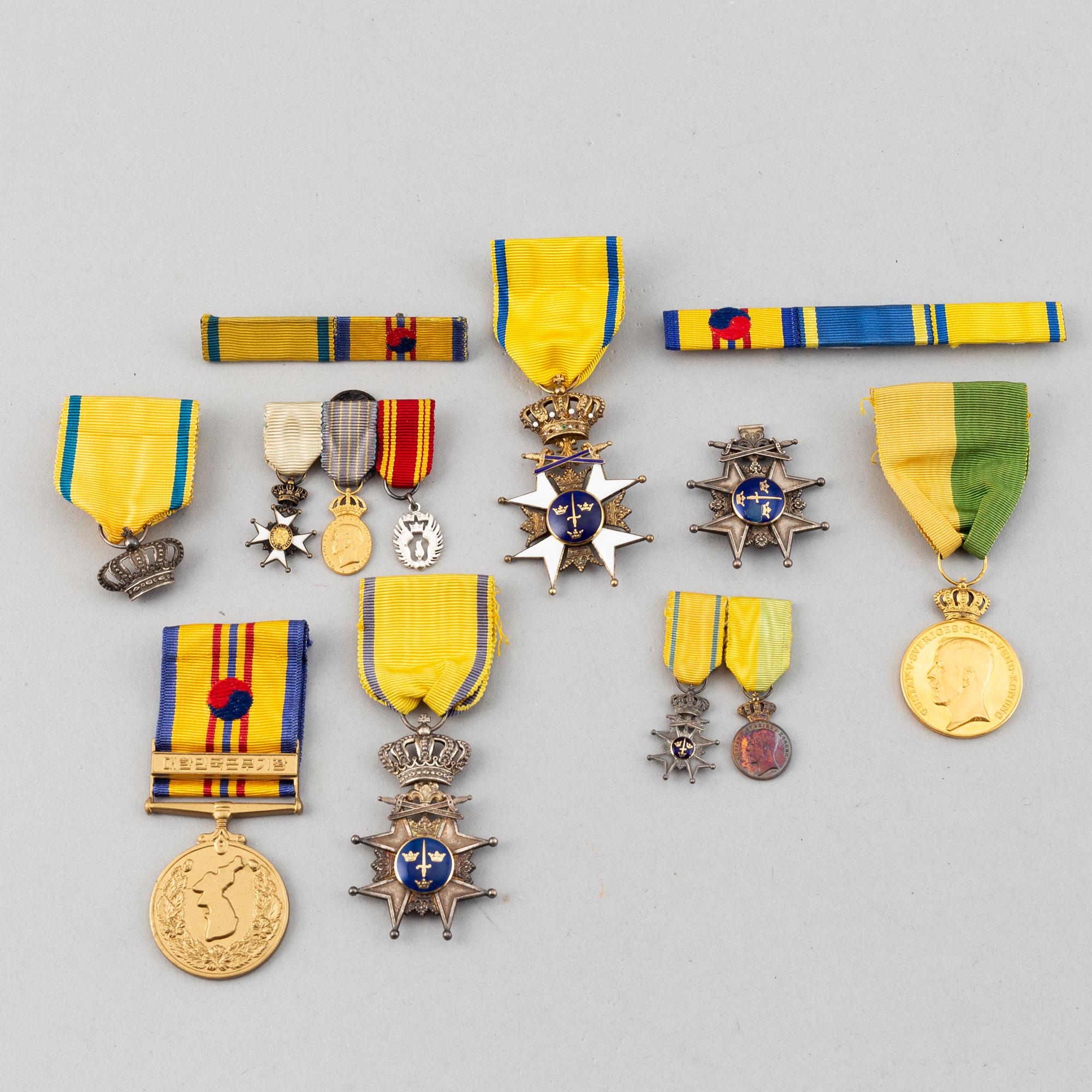 A set of medals and decorations, partly gold.