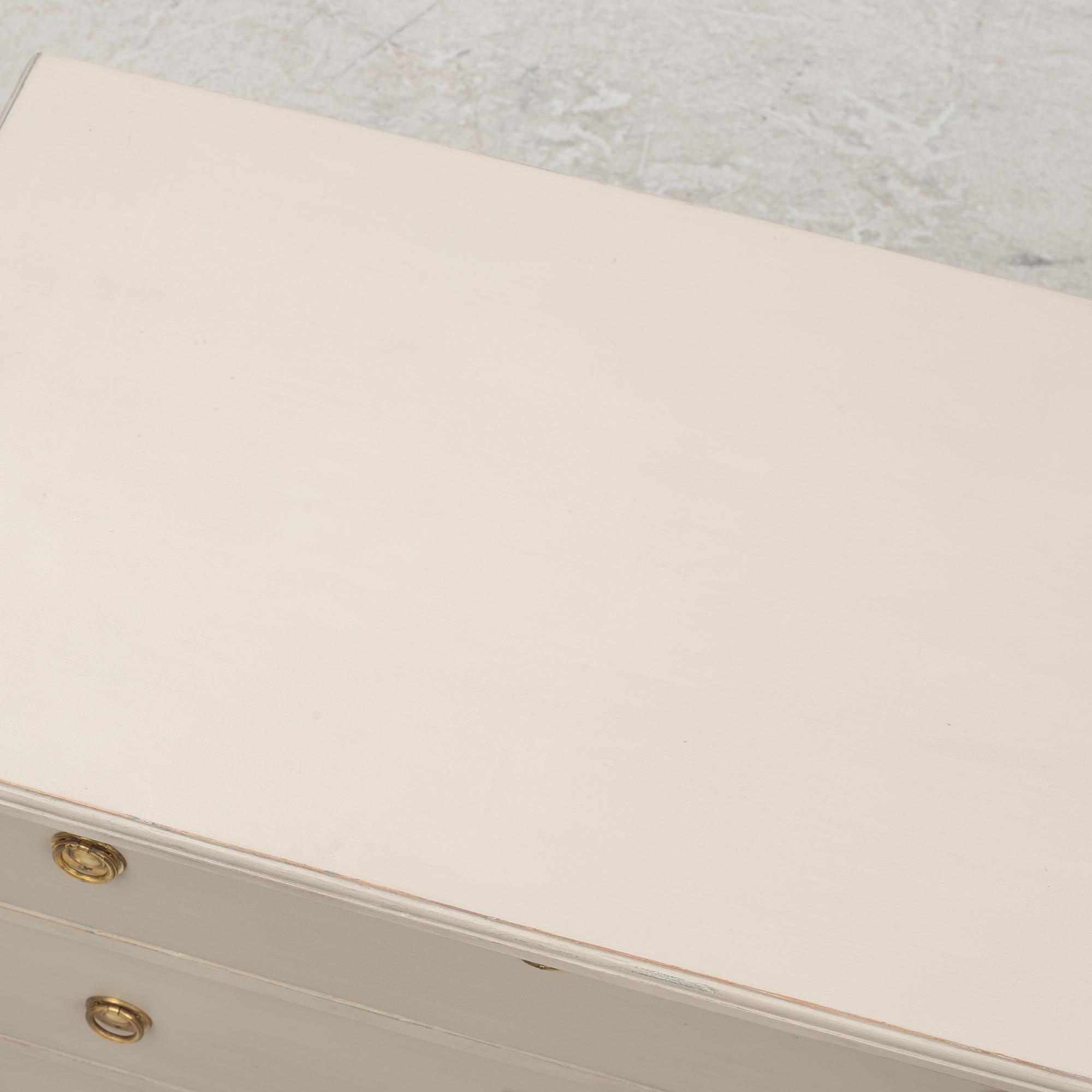 A pair of Gustavian style chest of drawers, mid 20th Century.