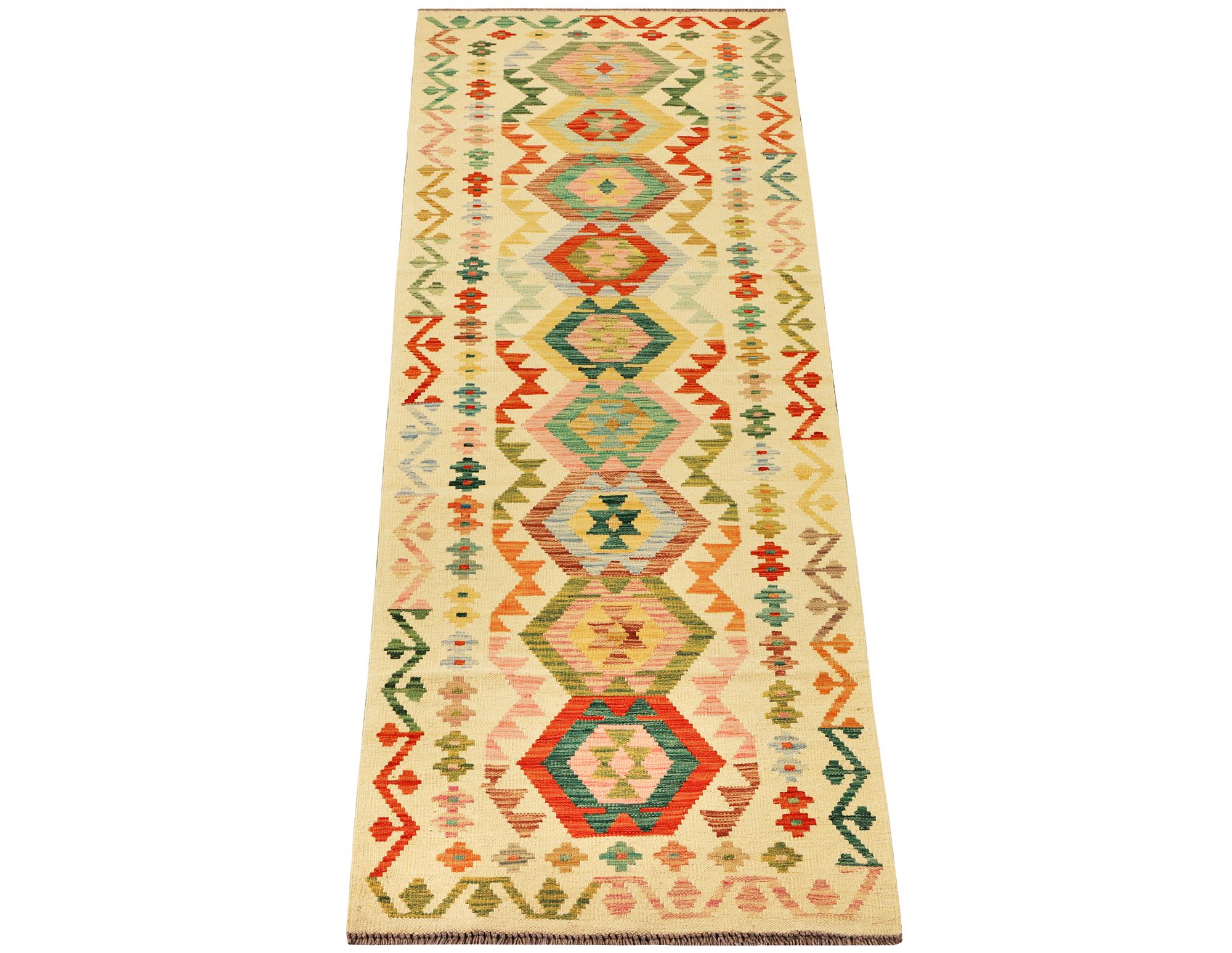 A Kilim runner carpet, c. 291 x 77 cm.