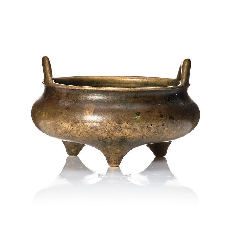 A tripod bronze censer, 17/18th Century with Xuande mark.