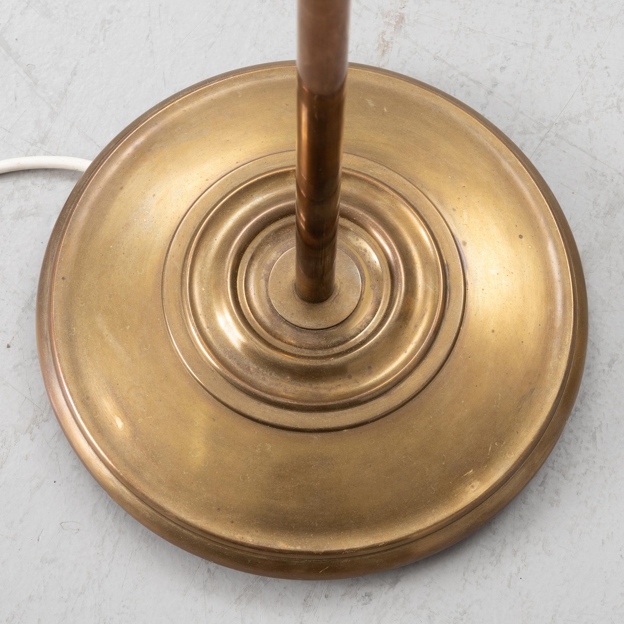 A brass floor lamp, Sweden, mid 20th century.