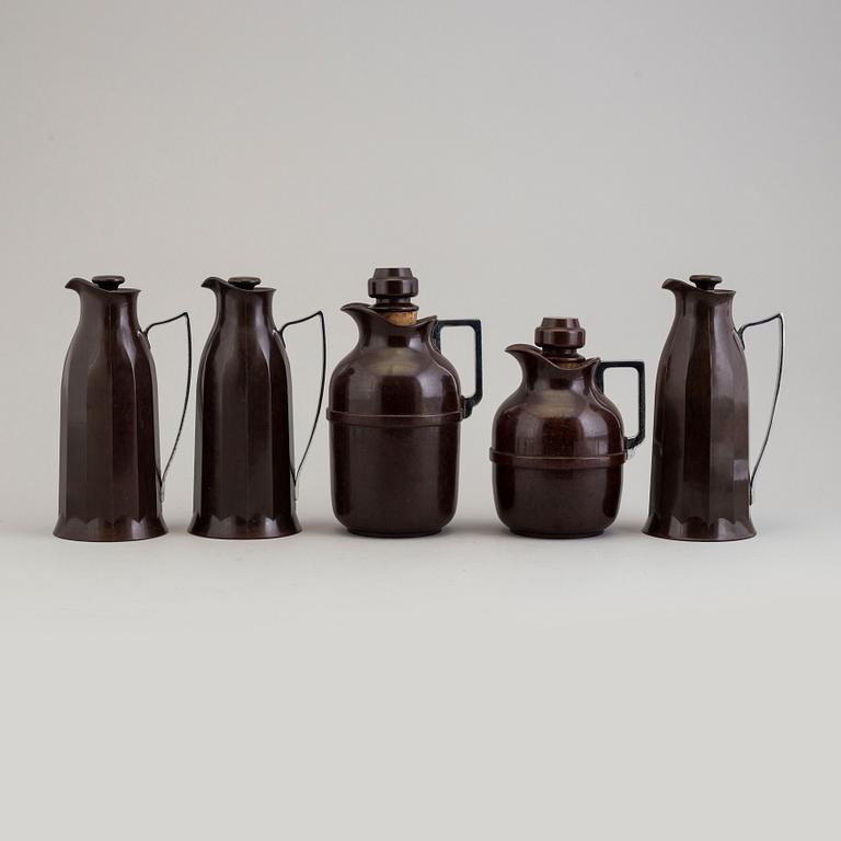 A set of five bakelit thermos, England, designed 1925.