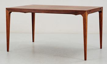 A Poul Hundevad palisander dining table with 8 chairs by Hundevad & Co, Denmark.
