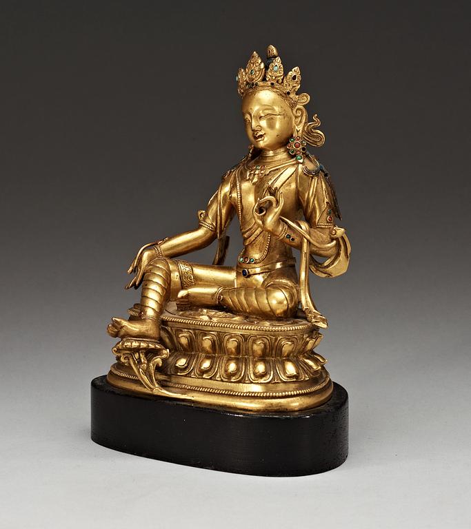 A gilt bronze figure of Green Tara, Sino-Tibetan, 18th Century.