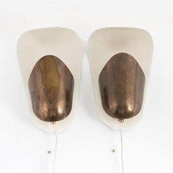 Harald Notini, a pair of model "8596" wall lamps, Arvid Böhlmarks Lampfabrik, Stockholm, 1940s-50s, 1940s-50s.