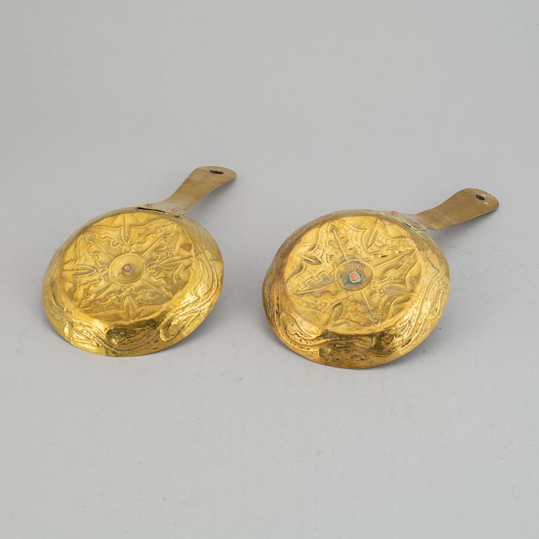 A pair of 19th century brass night light holders.
