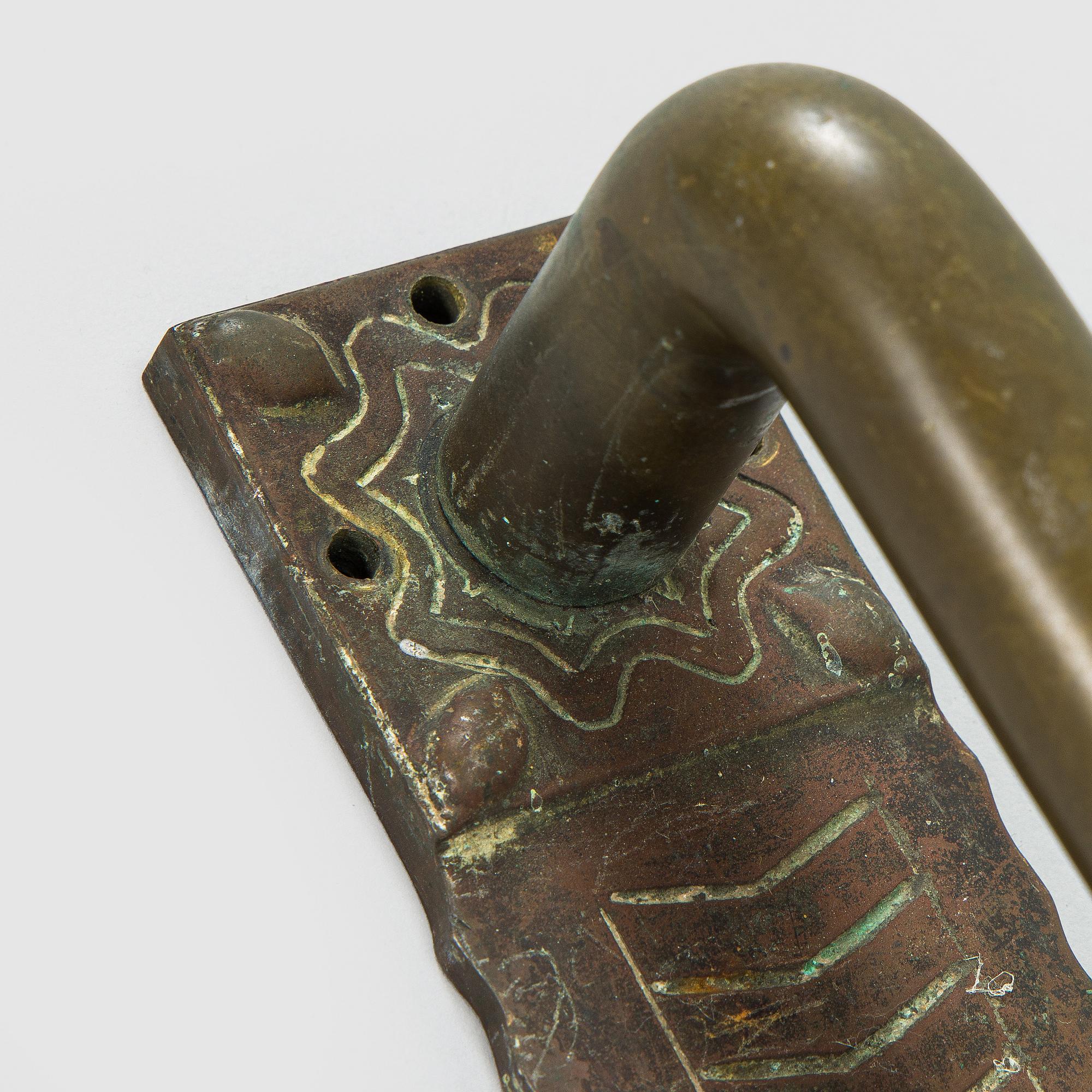 Dörrhandtag, två par, 1862 eller 1918.