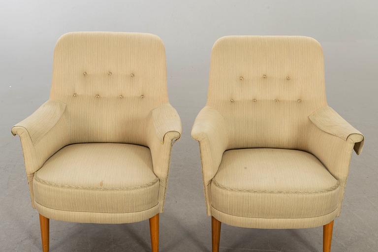 CARL MALMSTEN, a pair of easy chairs.