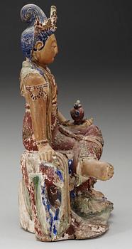 A seated wooden figure of Guanyin, Yuan/Ming dynasty.