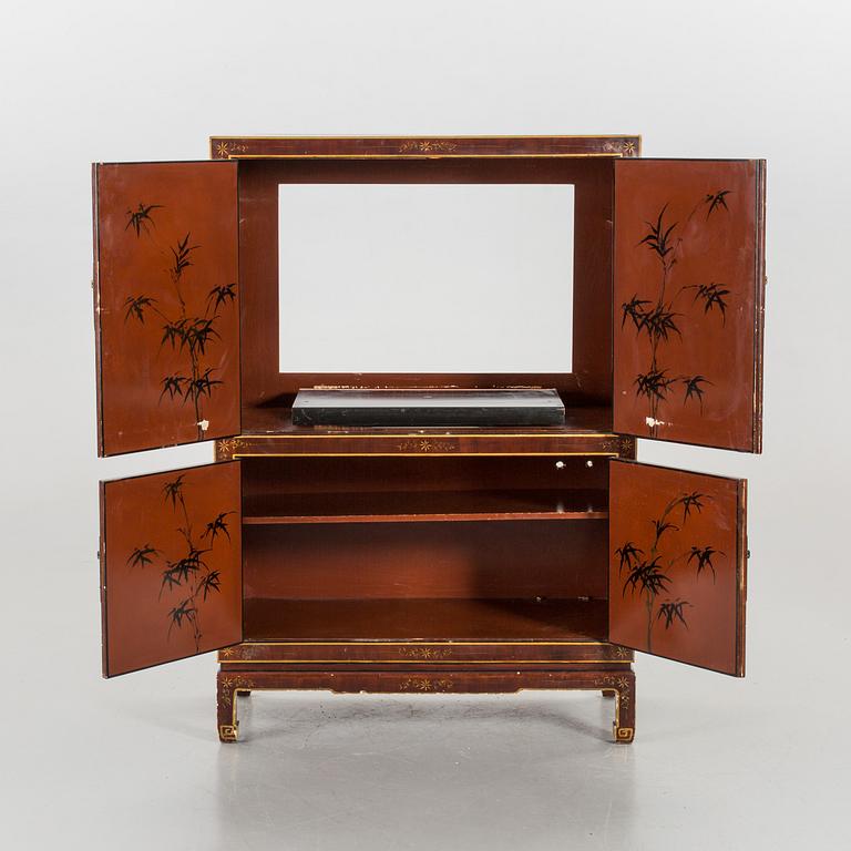 A Chinese style cabinet, later part of the 20th cwentury.