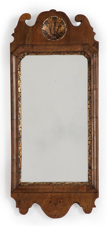 A George II gilt-gesso and walnut mirror, first part of the 18th century.