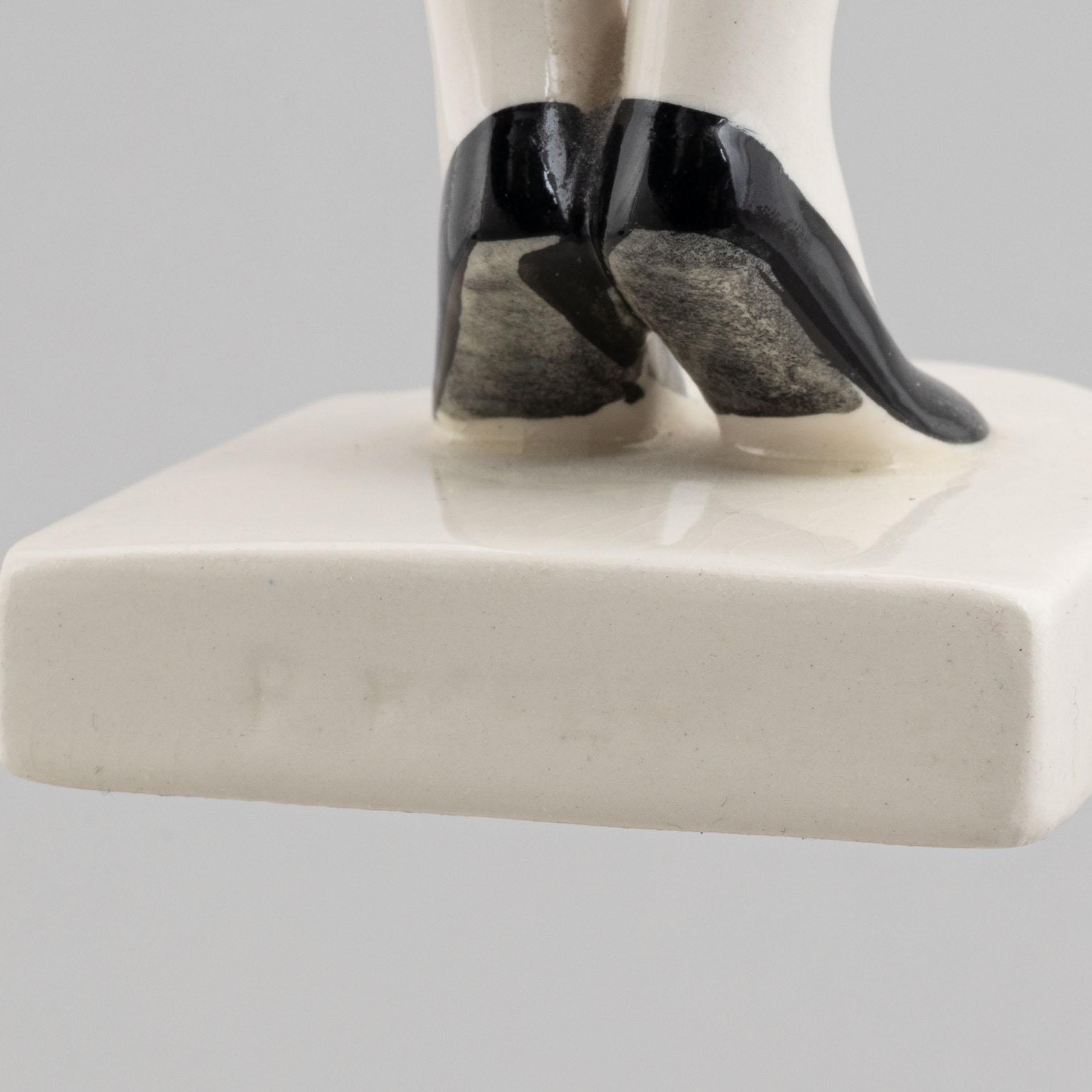 Rasmus Harboe, figurines, 2 pcs, faience, Aluminia, Denmark, early 20th Century.