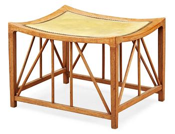 357. A Josef Frank so called 'Tutanchamon' mahogny and leather stool by Svenskt Tenn.