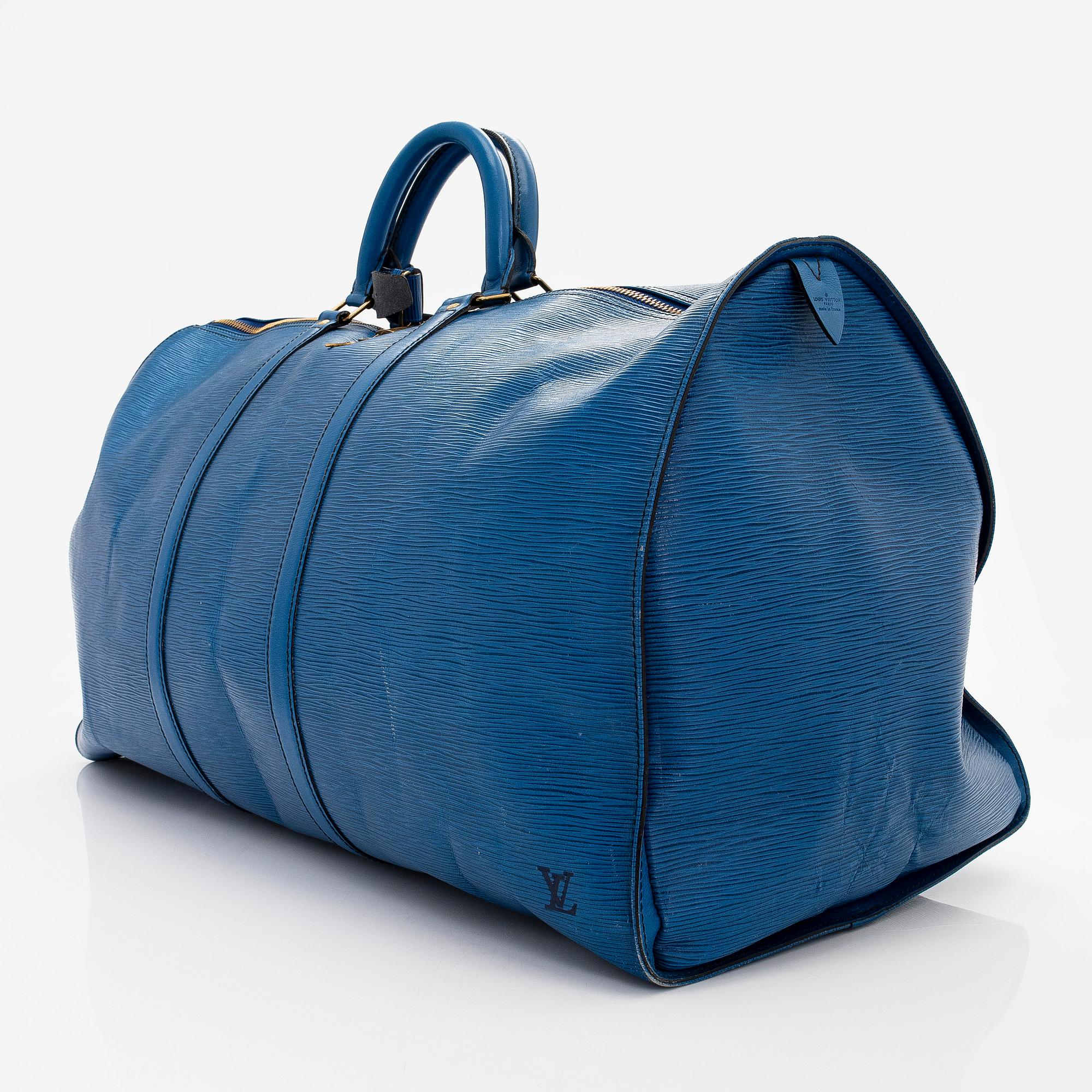Louis Vuitton, an 'Epi Keepall 60' weekend bag.