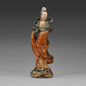 184. A yellow and green glazed potted figure of Guanyin, Qing dynasty, 17th century.