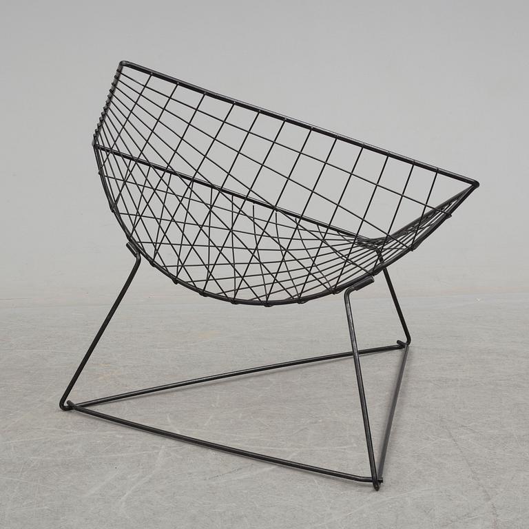 NIELS GAMMELGAARD, an 'Oti' easy chair from IKEA.