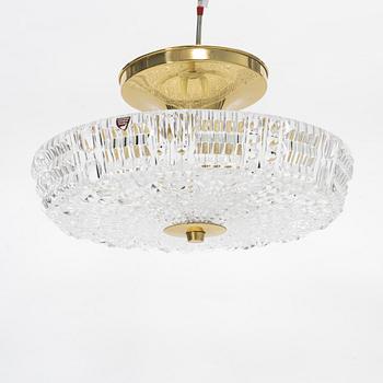 Carl Fagerlund, a glass and brass ceiling lamp, Orrefors, second half of the 20th century.