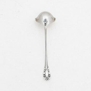 Georg Jensen, a small sterling silver gravy ladle, model "Liljekonvalj"(Lily of the Valley), Copenhagen, Denmark, 1929.