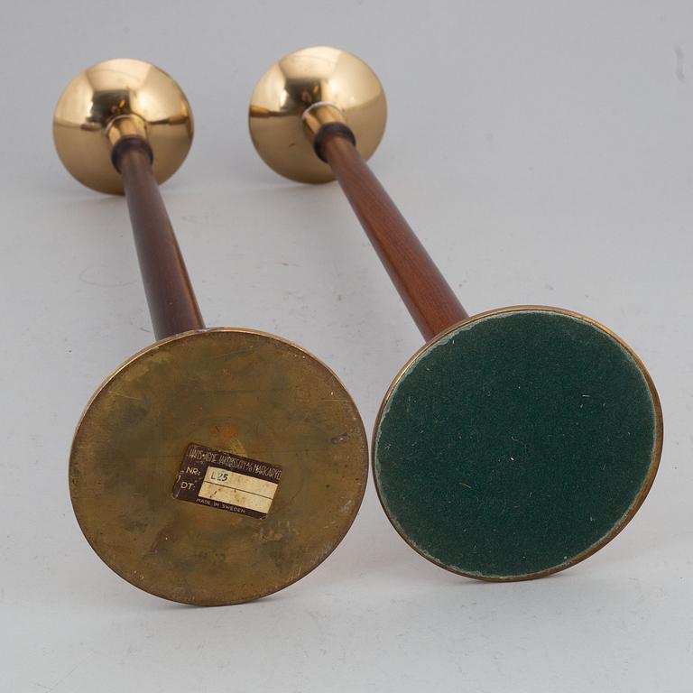 HANS-AGNE JAKOBSSON, a pair of brass and teak candle holders, Markaryd, mid 20th century.