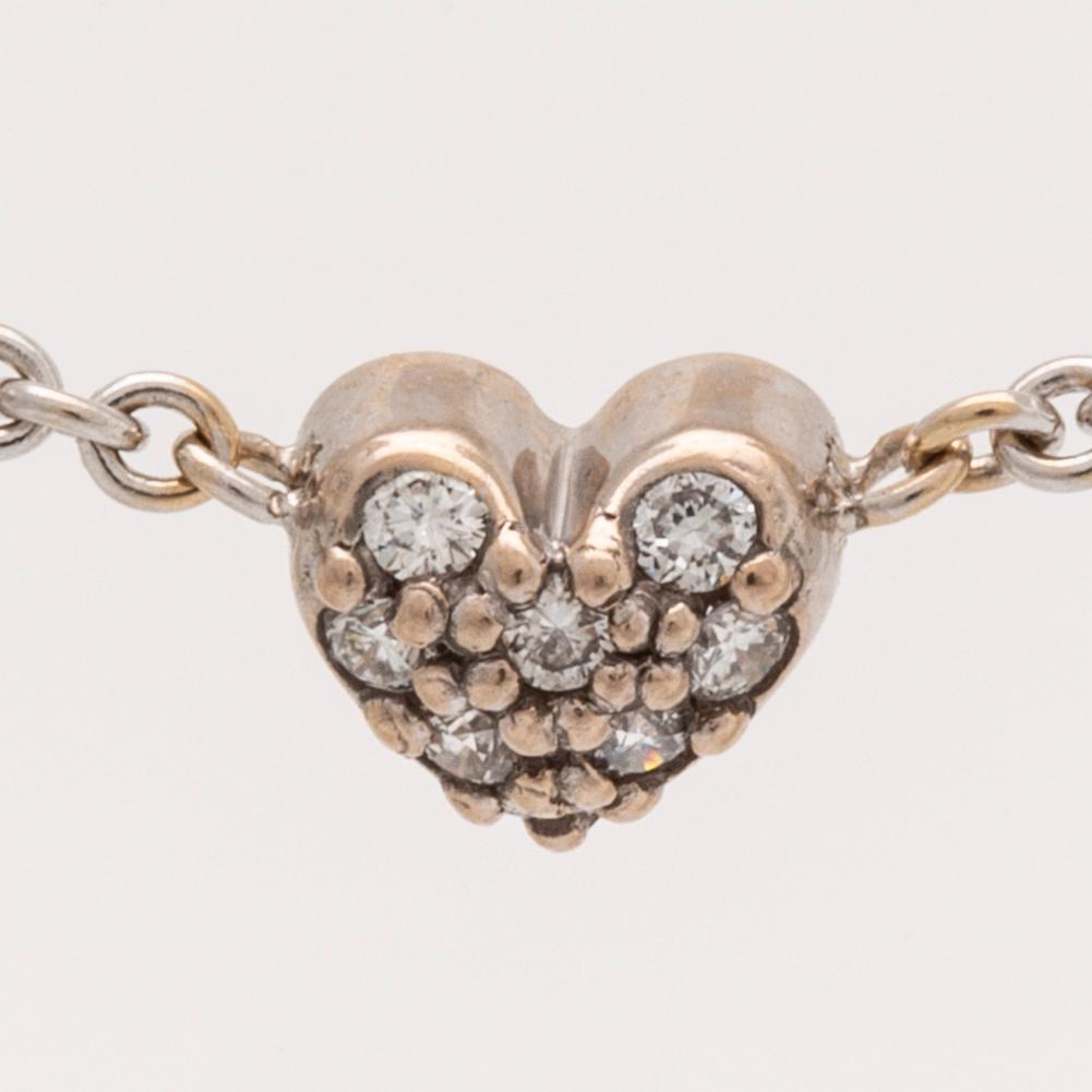 Lynggaard pendant on cjain, 18k whitegold brilliant-cut diamonds 0,08 ct, width heart approx 5 mm, length 40 cm, dustbag.