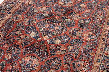 A semi-antique Sarouk carpet, c 275 x 185 cm.