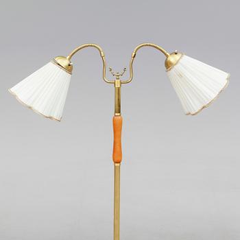 GOLVLAMPA, Pagos, 1900-talets mitt.